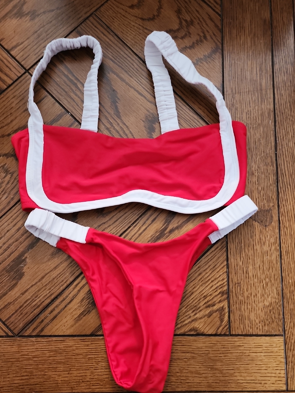 A4: Red/White bikini, very cheeky